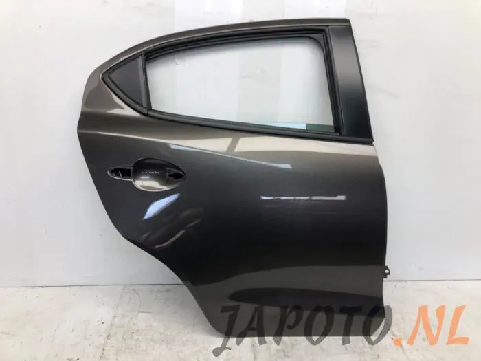 Puerta de 4 puertas derecha detrás Mazda 2.