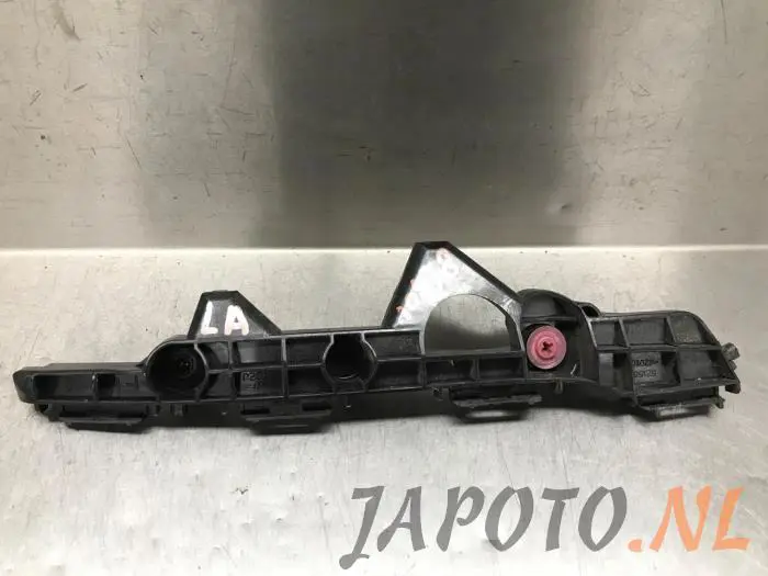 Soporte de parachoques izquierda detrás Toyota Rav-4