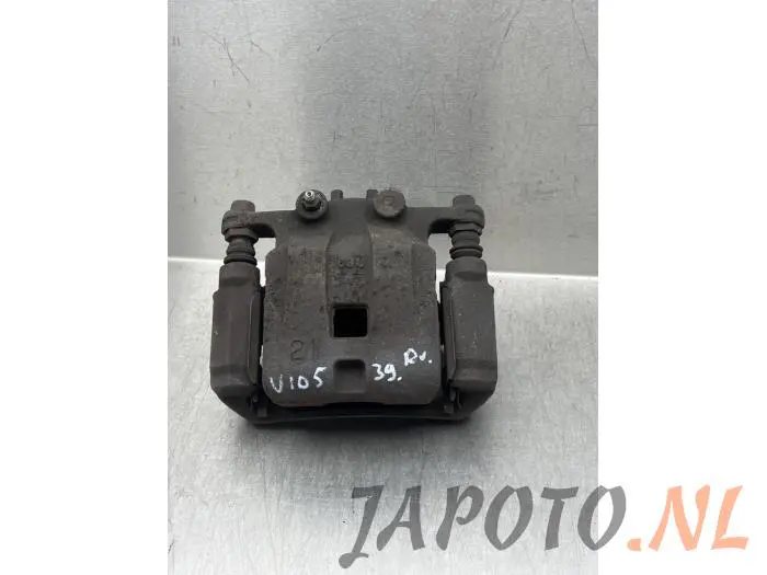 Pinza de freno derecha delante Daihatsu Materia