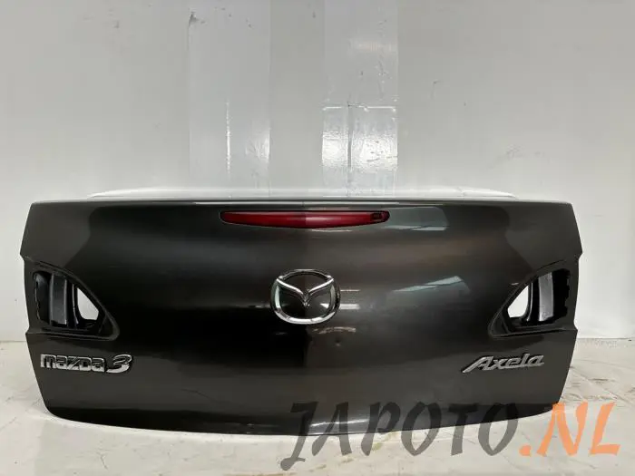 Cubierta de maletero Mazda 3.