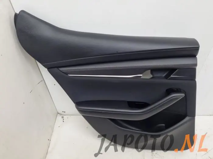 Tapizado de puerta de 4 puertas izquierda detrás Mazda 3.